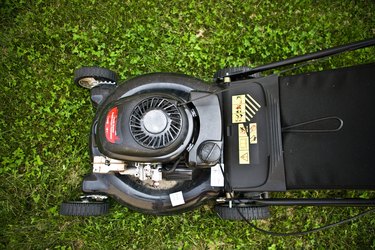 High angle view of lawnmower on grass