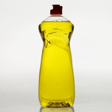 Full length view of washing up liquid bottle