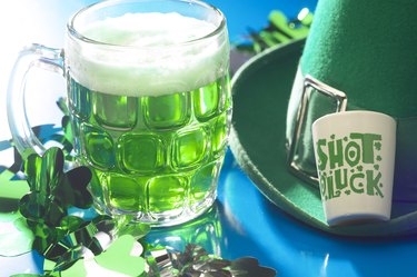 Green beer and a shot glass