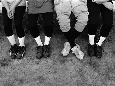 Photo, view of baseball players feet in the dugout, Grayscale