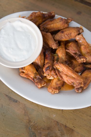 Plate of buffalo wings and ranch dressing