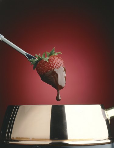 Indulgent strawberry dipped in chocolate fondue