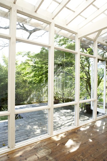 Empty conservatory leading to garden