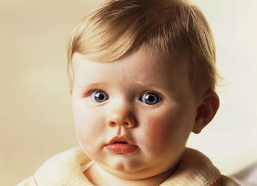 Portrait of a baby (12-18 months) looking at camera