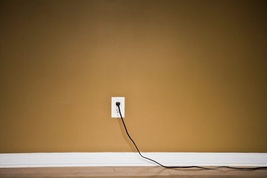 How to add a fourth socket in the wall without breaking the wall