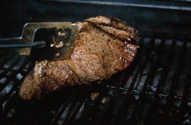 Peppercorn steak on grill