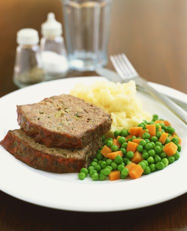 Meatloaf, potatoes, peas and carrots