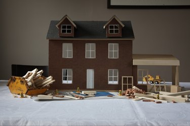 dolls house with extension in construction