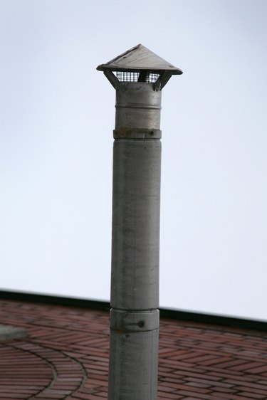 Pipe vent with baffle on roof
