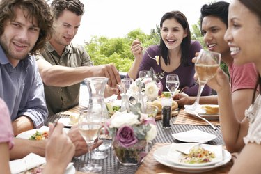 Friends Enjoying Dinner Party Outdoors