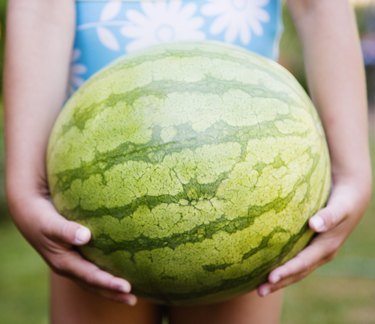 Girl Holding Watermelon