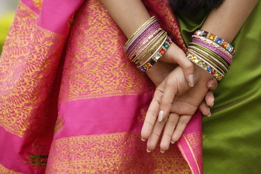 Woman wearing bracelets and sari