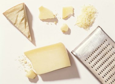 Parmesan cheese with grater