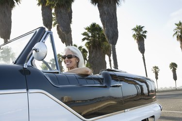 Woman in convertible