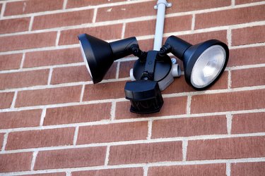 Outdoor light with outlet deals and motion sensor