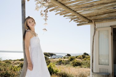 Woman standing on porch