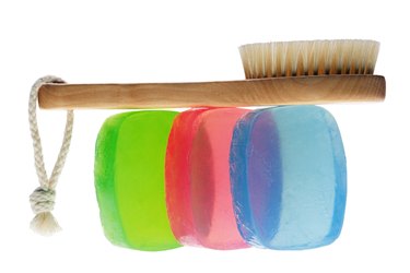 Brush balanced on bars of soap