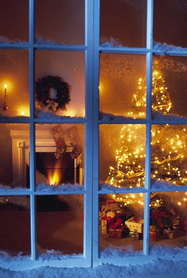 View through window of home decorated for Christmas