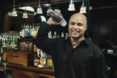 Bartender with cocktail shaker
