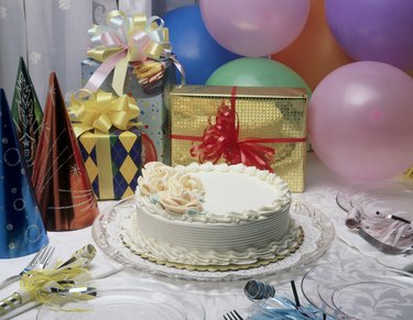 Close-up of a birthday cake and presents