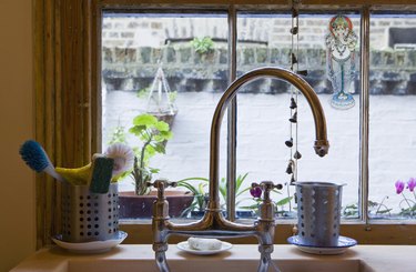 Kitchen sink with utensils