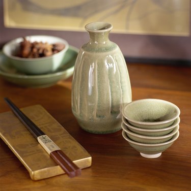 Chopsticks and soy sauce pitcher and bowls