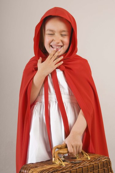Girl in red cape with basket