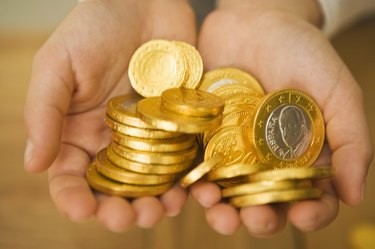 Child holding chocolate coins