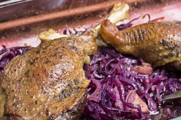 Goose legs baked on red cabbage