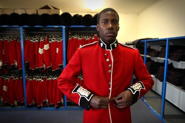 Soldiers From The Irish Guards Prepare For Ceremonial Duties Ahead Of The Royal Wedding