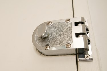 Close-up of surface mount deadbolt door lock