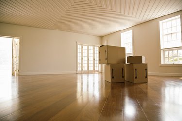 Moving boxes in empty room