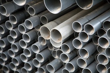 Stack of PVC pipe at construction site