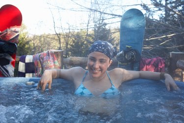 Young woman in hot tub