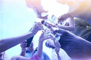 low angle view of a group of people toasting