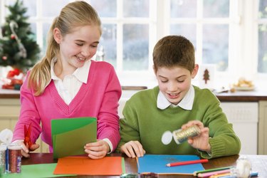 Children making Christmas cards