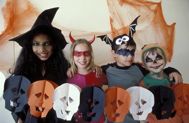 Portrait of children dressed up Halloween costumes