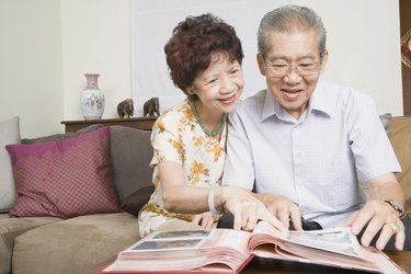 Couple looking at photo album