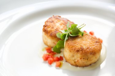 Crab cakes over a citrus beurre blanc