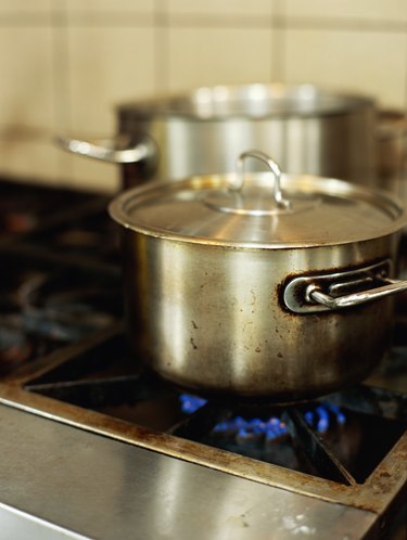 saucepan on a burner in the kitchen