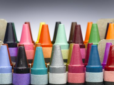 Rows of colourful crayons, close-up