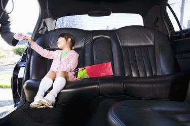 Girl sitting in limousine