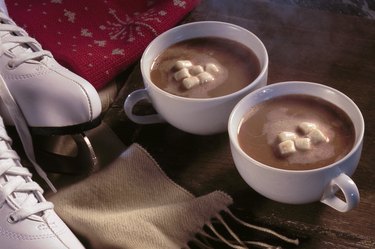 Hot cocoa with scarf and ice skates