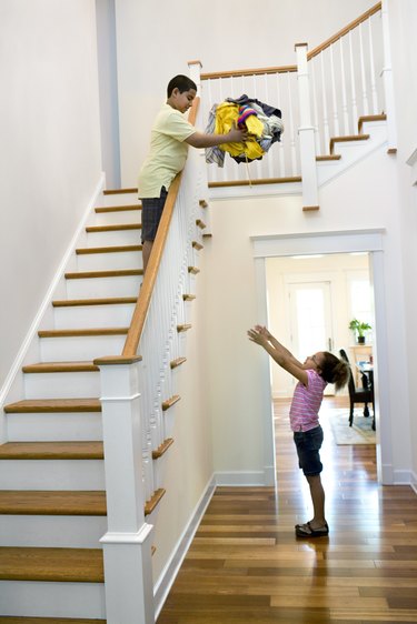 Kids helping with laundry