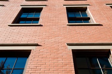 Low angle viw of brick building with windows