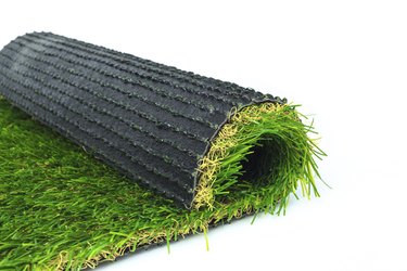 Artificial turf green grass roll on white background
