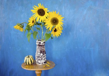 retro vase with sunflowers