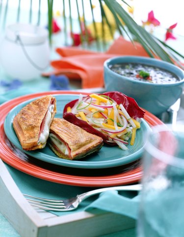 Ham and cheese panini with jicama salad and black bean soup