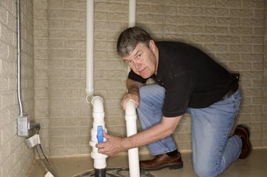 Man checking pipes