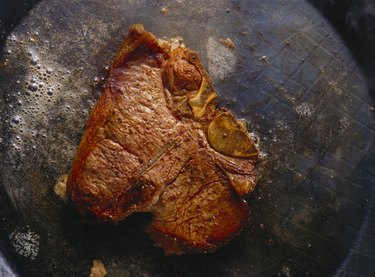 Porterhouse Steak frying in Butter